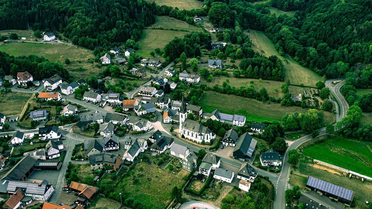 Aerial view of Germany's diverse landscape: mountains, forests, rivers, and historic towns
