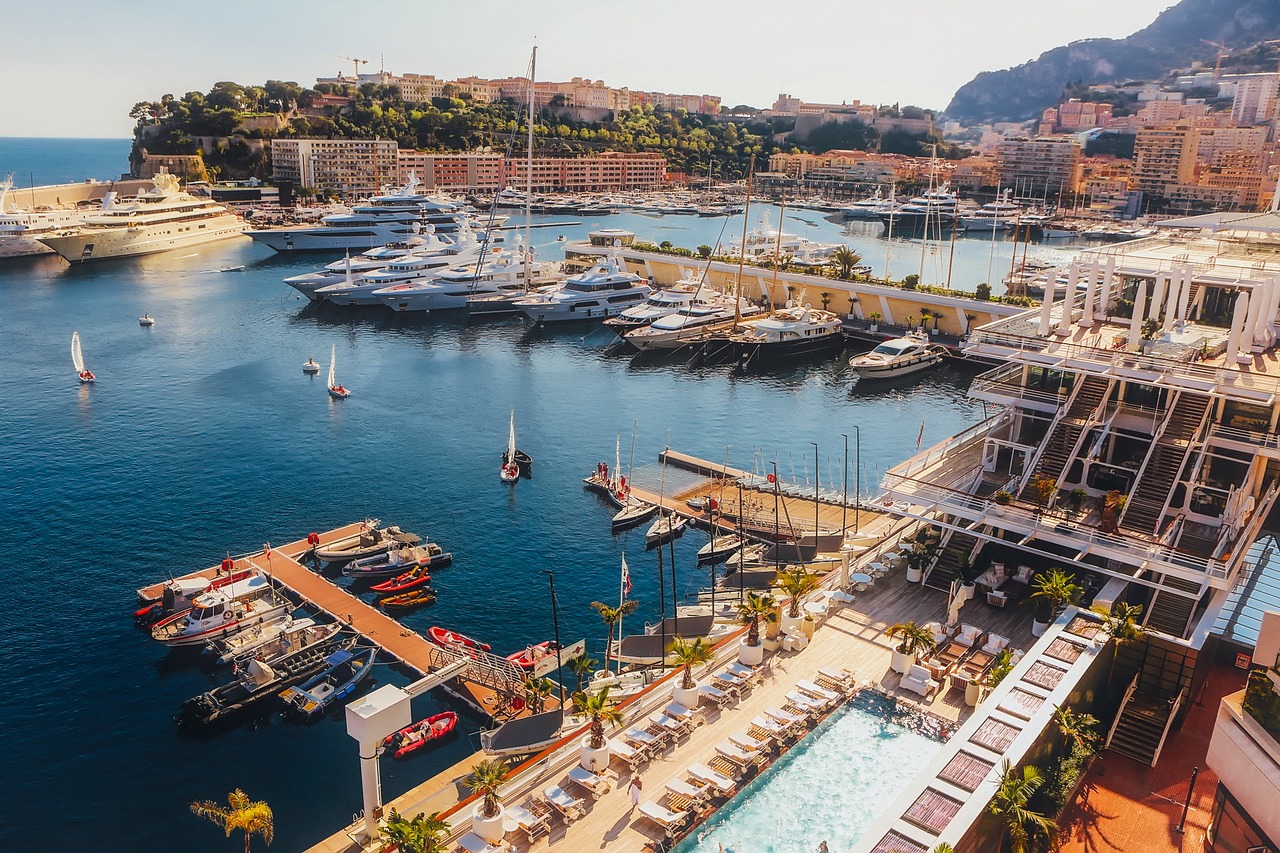 Vibrant pastel-colored houses cascading down to the deep-blue harbor of Villefranche-sur-Mer, a picturesque gem on the Côte d’Azur Colorful buildings lining the harbor of Villefranche-sur-Mer on the French Riviera