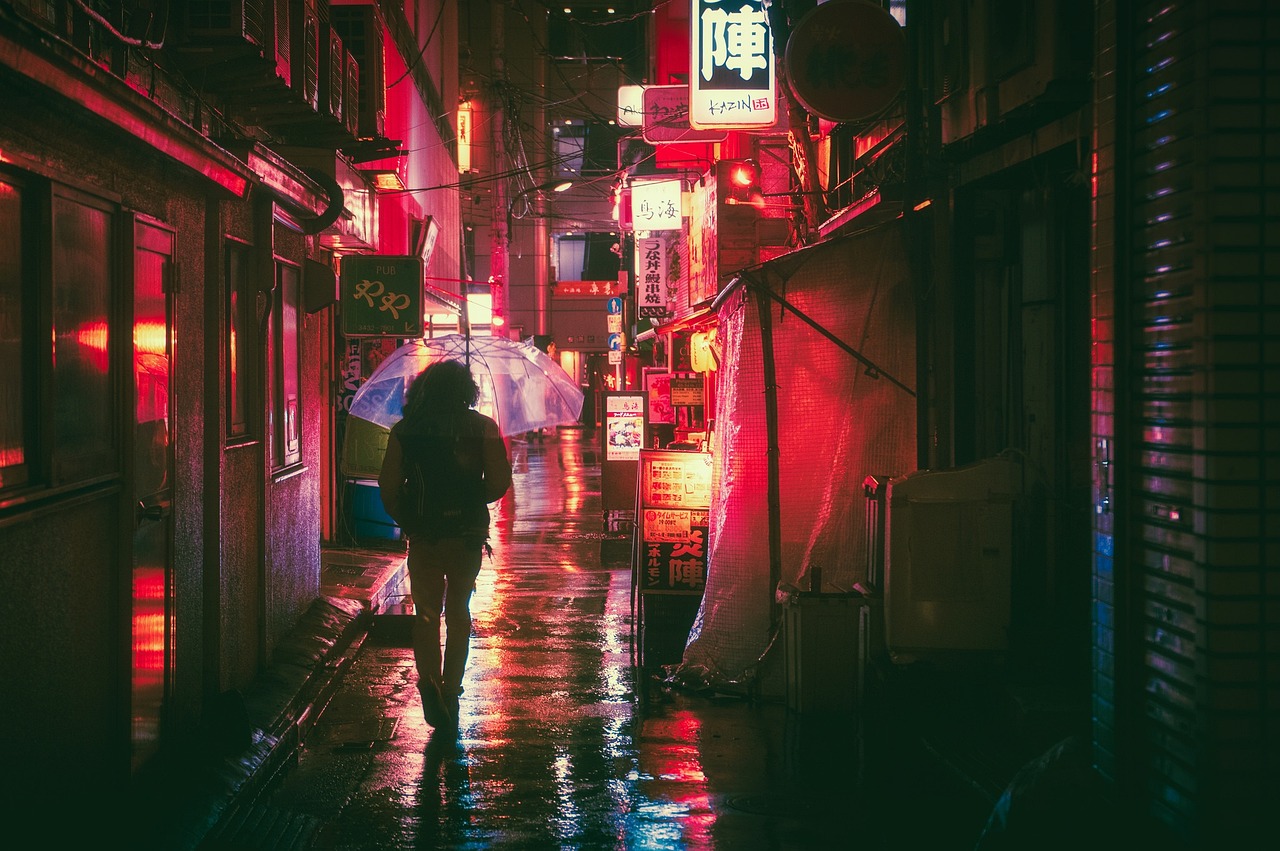 Dotonbori’s dazzling neon lights and iconic food mascots — a vibrant, sensory-rich highlight among the top places to visit in Japan Dotonbori street in Osaka at dusk with giant crab and pufferfish signs, colorful lights, and bustling crowds