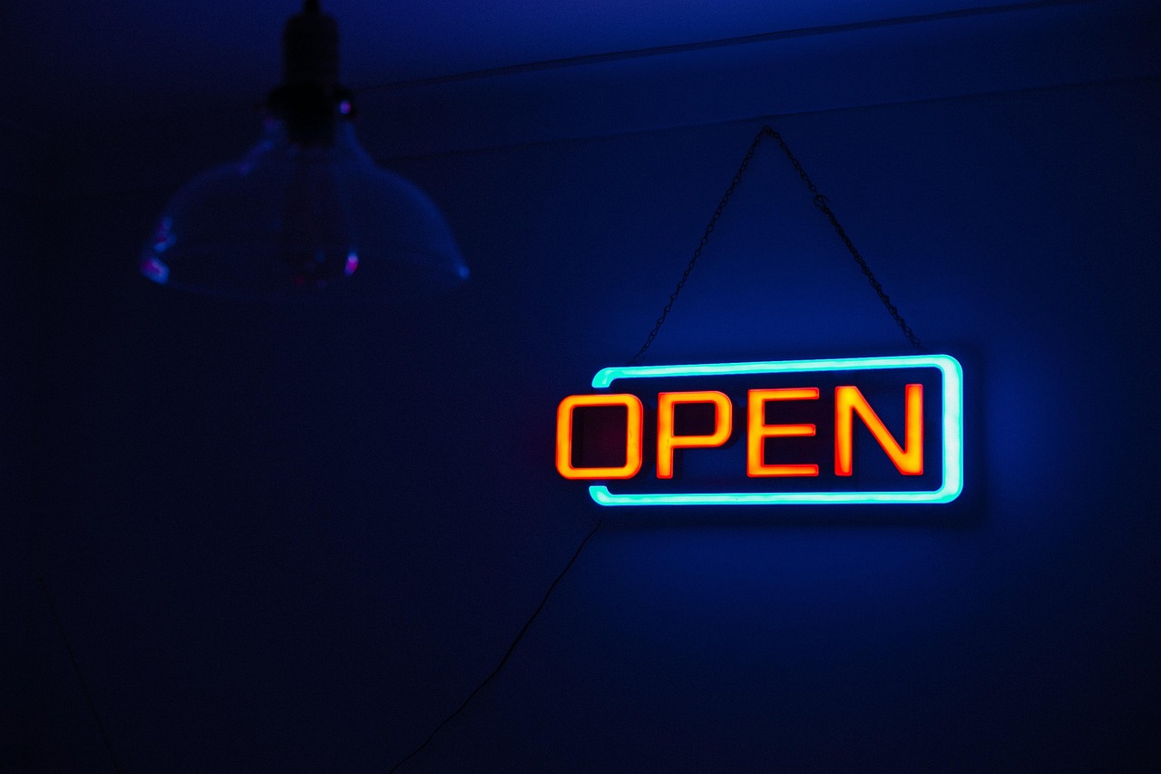 Vibrant neon signs glow against brick facades on Lower Broadway — the lively, musical pulse of must-visit places in the USA Neon-lit Honky Tonk bar sign glowing on Lower Broadway in downtown Nashville
