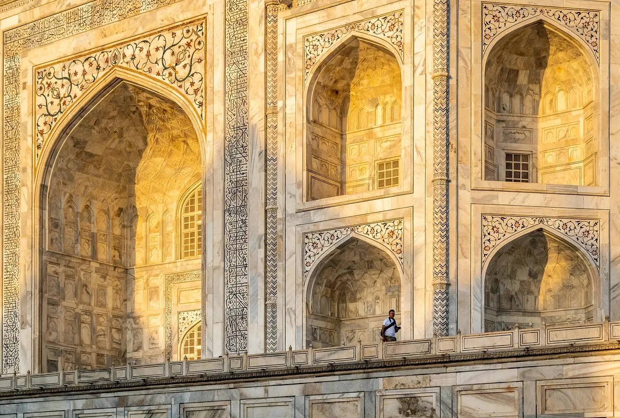 The Taj Mahal mirrored in still water at dawn — a poetic, symmetrical composition that underscores why visiting ancient landmarks continues to stir universal emotion. Taj Mahal reflected perfectly in the Yamuna River at sunrise