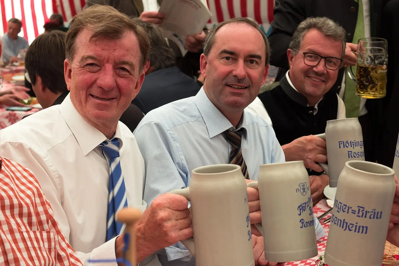 Colorful tents and people celebrating at a traditional German beer festival