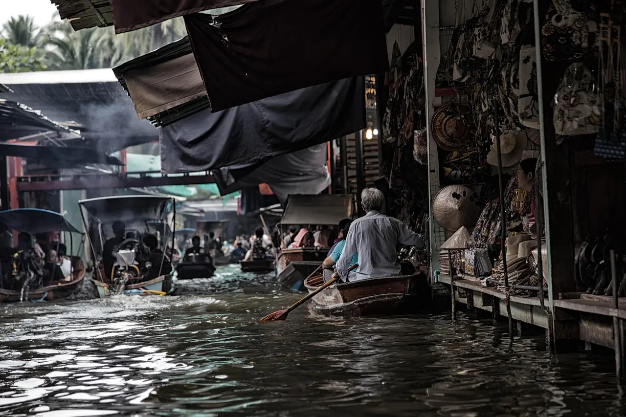 Chatuchak Weekend Market in Bangkok: A labyrinthine treasure trove and must-visit shopping destination for travelers seeking authenticity and variety Overhead shot of maze-like aisles at Chatuchak Market filled with textiles, ceramics, and potted plants