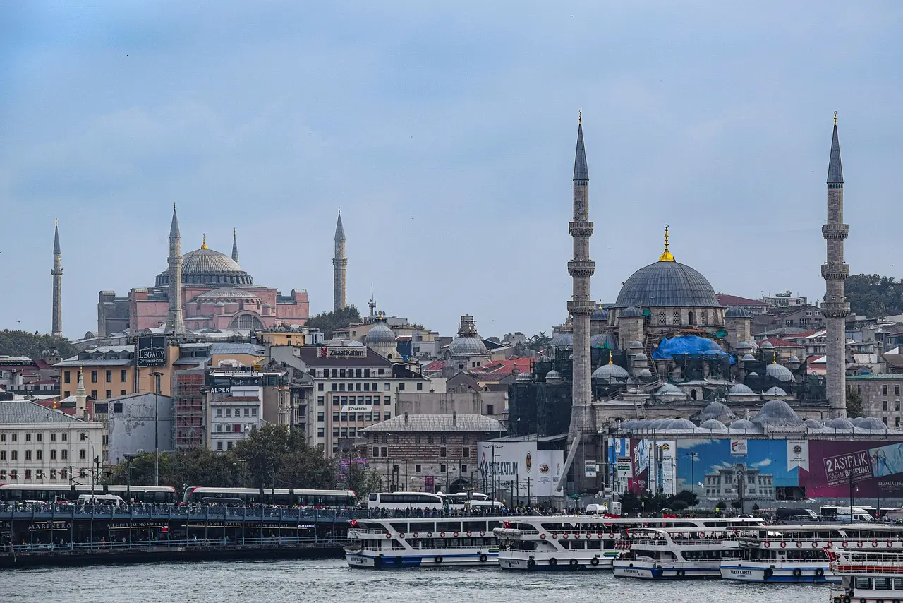 Aerial view of Istanbul showing Hagia Sophia, Blue Mosque, and Bosphorus at sunset