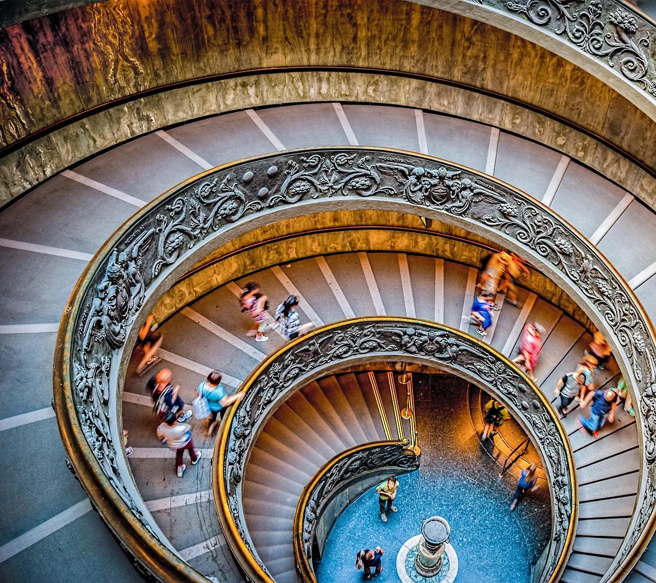 Crowd-free view of Vatican Museums spiral staircase, early morning light
