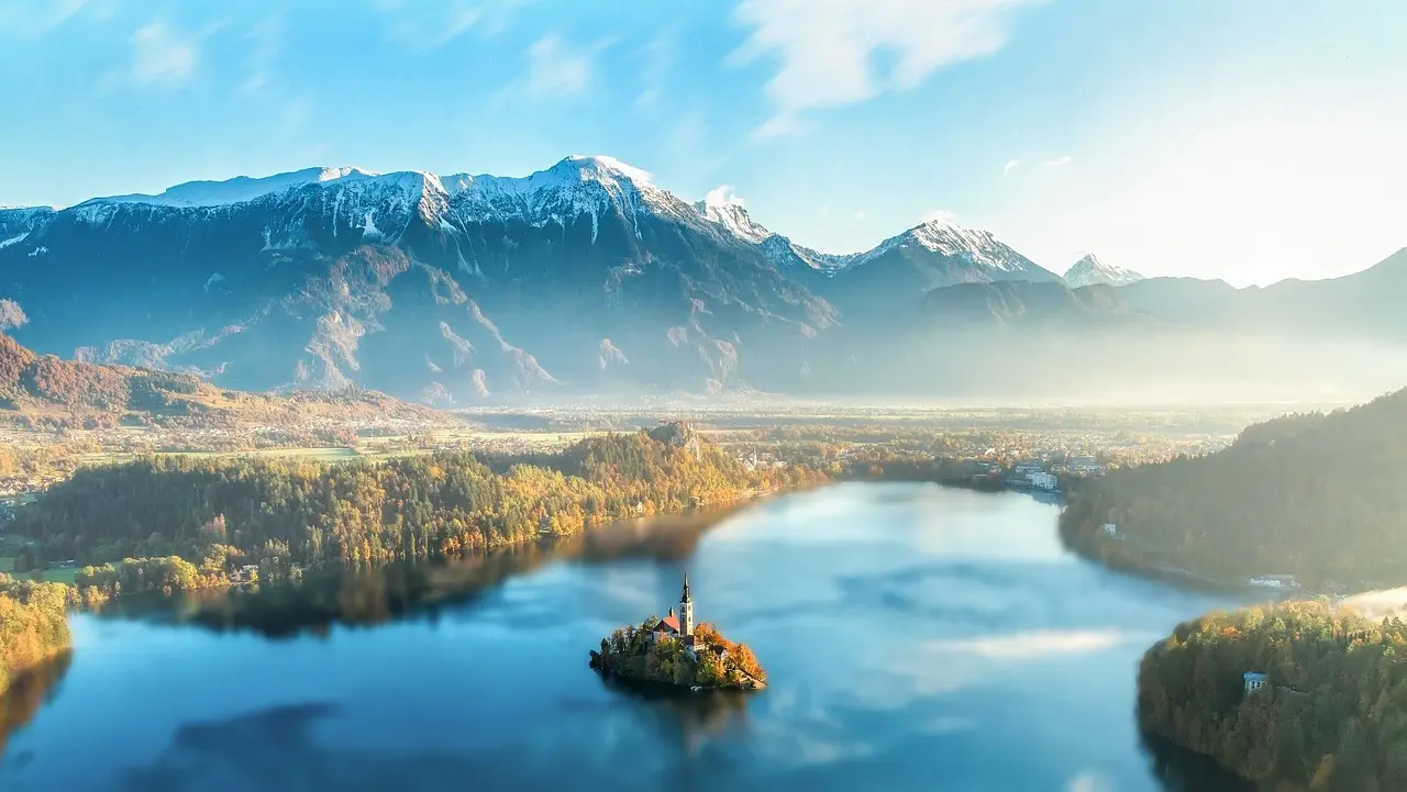 Lake Bled with island church and Julian Alps in background