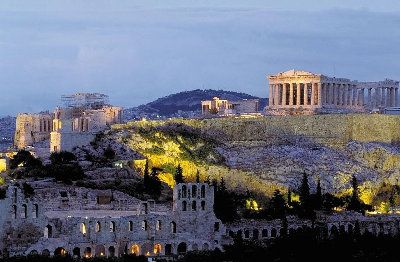 Parthenon on Acropolis hill at sunrise with soft golden light